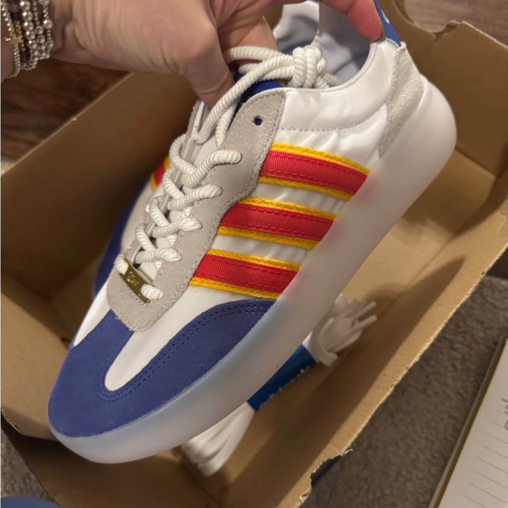 adidas Originals Blue and White Sneakers with Red and Yellow Stripes